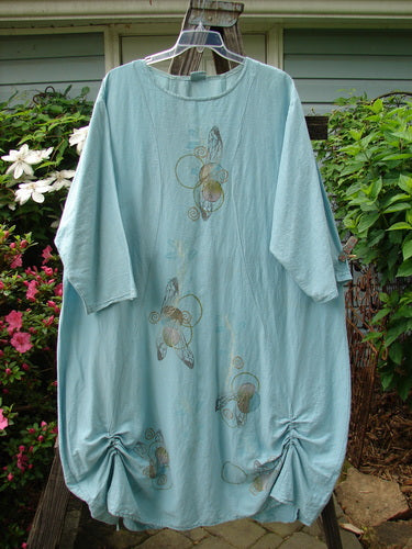 Alt text: Barclay Hemp Cotton Silk Voile Belle Dress Wing Water Size 2 featuring a butterfly pattern and unique tailoring details.