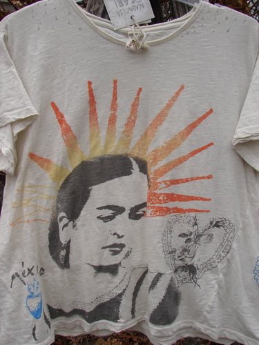 Magnolia Pearl NWT Cotton Jersey Boyfriend Tee Frida Del Sol True OSFA features a drapey fit with stylized portrait and sunburst graphic, ornate heart motif, and México text. Perfect condition, showcasing creative individuality.