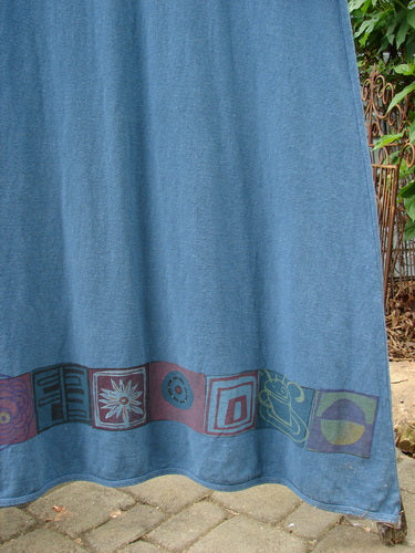 Alt text: Barclay Hemp Cotton Curved A Line Dress Elements Tealen Blue Size 2, featuring an extra-long length, wide A-line shape, downward curved empire waist seam, longer cozy sleeves, and vintage theme paint.