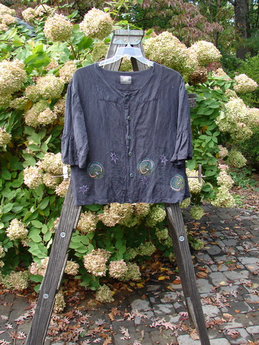 2000 Hemp Viscose Rodeo Top with space-themed paint. Fitted shape, pleated sleeves, textured buttons. Size 1.