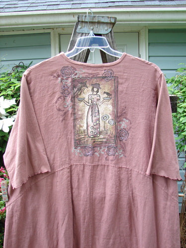 Barclay Linen Cotton Sleeve Banded Hem Pleat Dress Bird Gal Dusty Mauve Size 2 on hanger, featuring a woman holding two bowls drawing, rounded neckline, empire waist seams, and three-quarter length sleeves.