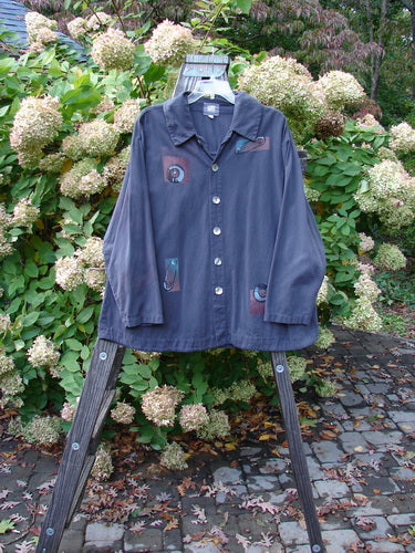 2001 P3 Top Junk Drawer Licorice Size 1: A blue shirt with a design on it, featuring a swing silhouette, soft brushed feel, and abalone shell buttons.