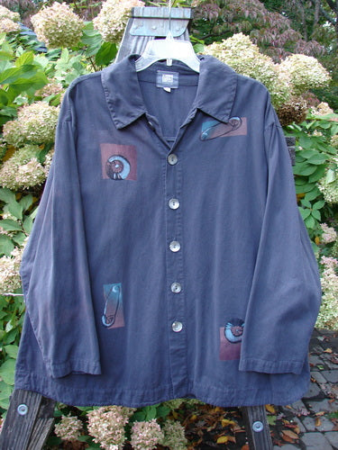 2001 P3 Top Junk Drawer Licorice Size 1: A blue shirt with a design on it, featuring a darling swing, soft brushed feel, and abalone shell buttons.