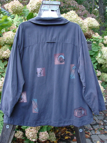 Image alt text: "2001 P3 Top Junk Drawer Licorice Size 1: A swing-style jacket with a collar, adorned with a design. Features include thick abalone shell buttons and a rounded hemline. Made from soft cotton twill. Bust 48, Waist 50, Hips 54, Swing 60, Length 29 inches."