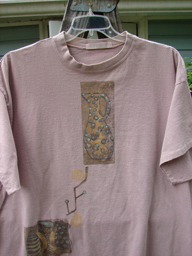 Vintage 1995 Short Sleeved Tee featuring Vase Paint design in Patio Rose. Altered to Size 2 with ribbed neckline, drop shoulders, and boxy shape. Organic Cotton. Bust 62, Waist 62, Hips 62, Length 30.