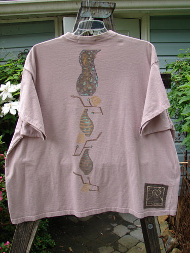 Vintage 1995 Short Sleeved Tee featuring a detailed vase design in Patio Rose. Made from Organic Cotton, altered to size 2 with drop shoulders and a boxier shape. From BlueFishFinder's collection of unique, creative fashion.