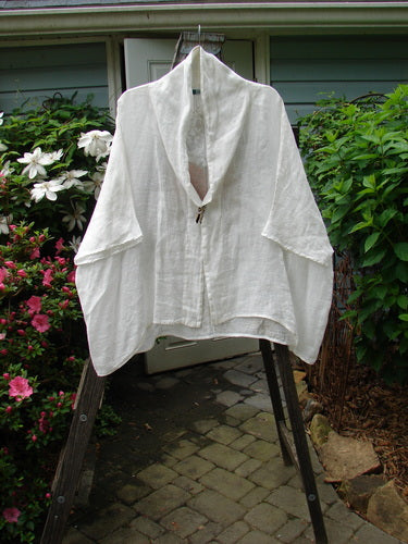 Barclay Linen Open Front Sweep Jacket Elephant White Size 2, showcasing dolman sleeves, rounded hemline, and intricate elephant theme on the rear. From BlueFishFinder's Vintage Blue Fish Clothing collection by Jennifer Barclay.