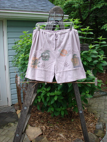 Vintage 1994 Bushel Pocket Garden Short with Mixed Theme from BlueFishFinder.com. Mid Weight Cotton, Drawstring Waist, Bushel Pockets, Double Panel, Short Inseam. Unique Fruit and Picture Designs. Size 1.