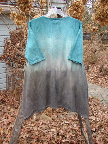 Barclay NWT Wander Tunic Tee featuring a dip-dyed design on a rustic ladder, illustrating its straighter tunic shape and varying length, reflecting BlueFishFinder's vintage clothing ethos.