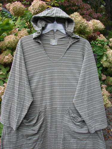 2000 Resort Hooded Pocket Pullover, black olive grey stripe, size 2: A striped hoodie with a flowing oversized hood and elastic-topped pockets.