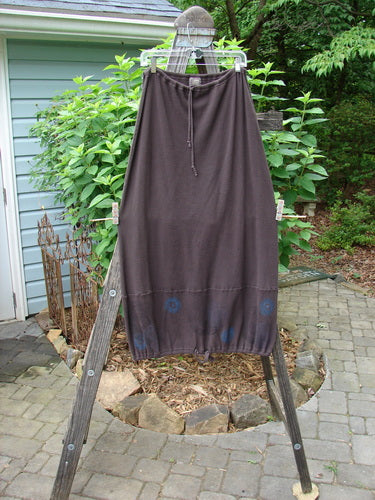 2000 Thermal Grattan Skirt Bubble Brum Size 1 on a clothes rack, featuring a full drawstring waistline, sectional lower horizontal panel, and classic Winter 2000 bubble theme paint.