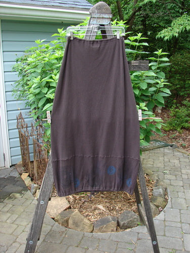 2000 Thermal Grattan Skirt Bubble Brum Size 1 displayed on a wooden stand with a full drawstring waistline and paneled hemline, showcasing its unique Winter 2000 bubble theme paint.