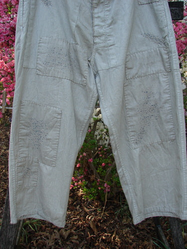 Magnolia Pearl NWT European Denim Lilou Trouser Natural Pinstripe OSFA features light-gray, loose-fitting design with square patchwork reinforcements, adjustable button fly, and distinctive handcrafted stitchery.