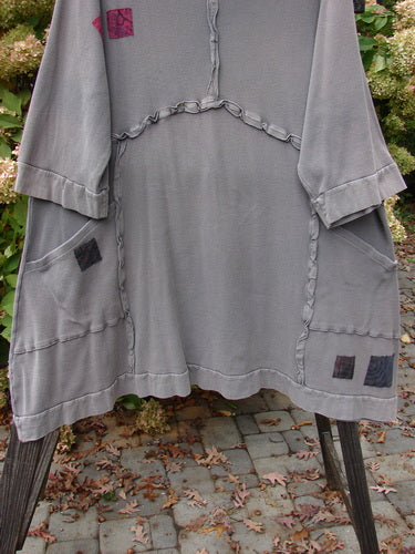 Barclay Patched Thermal Dress with Exterior Pockets, Size 2. Curvy stitchery, sectional panels, and banded hemline. Cozy turtleneck and faded full sleeves.