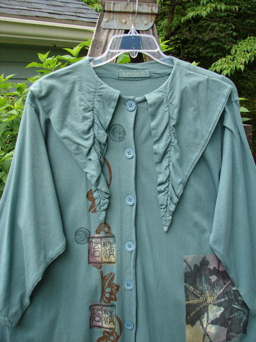 Vintage 1994 Falling Leaves Jacket with Asian forest and leaf theme in Deep Sea. Features a uniquely stitched pointed collar, A-line shape, and original Blue Fish buttons. Perfect condition with alterations for a tailored fit.