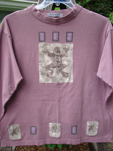 1996 Long Sleeved Tee Frog Pond Petunia Size 0, featuring a whimsical frog design on mid-weight organic cotton with a thicker ribbed neckline and slightly dropped shoulder.