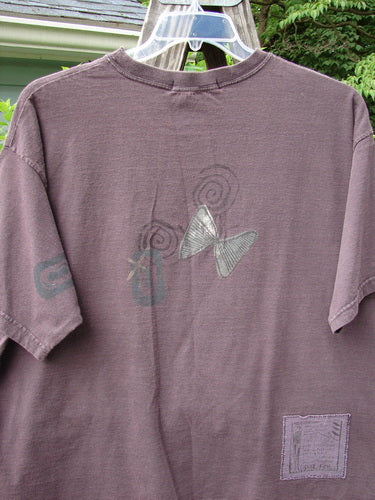 Vintage 1995 Short Sleeved Tee featuring a butterfly design from Madderlake. Altered to Size 2 for a slim fit. Organic cotton with ribbed neckline, drop shoulders, and atom paint details. Bust 52, Waist 52, Hips 52, Length 26 inches.