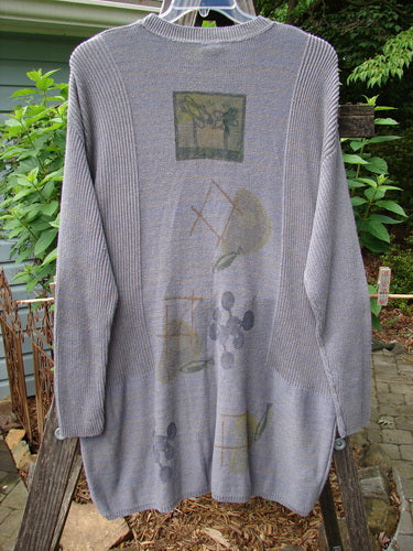 Vintage 1995 Cotton Rayon Linear Tunic Top featuring Atom theme paint, variegated yarns, ribbed neckline, and dippy hemline. From BlueFishFinder, offering unique vintage Blue Fish Clothing for creative self-expression.