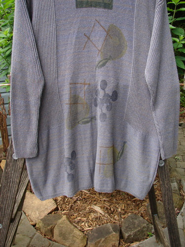 Vintage 1995 Cotton Rayon Linear Tunic Top featuring Atom theme paint, variegated yarns, ribbed neckline, and dippy hemline. From BlueFishFinder, offering unique vintage Blue Fish Clothing for creative self-expression.