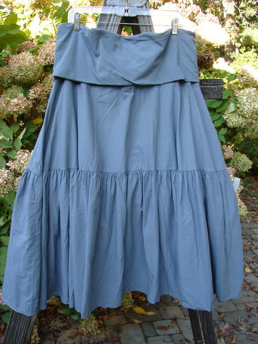 Barclay NWT Linen Fold Over Trinity Skirt, size 2, on a rack. A full paneled waistline, A-lined hemline with a sweet flutter-like lower. Large lower sweep for easy mixing, matching, and layering with other Spring Summer Wonders!