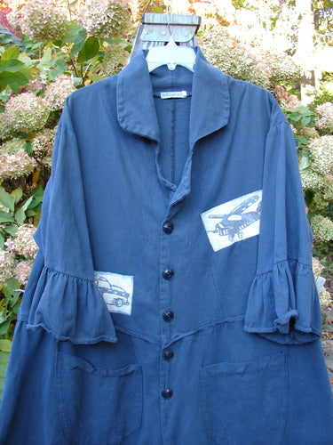 A navy Barclay PMU Patched Twill Decora Brushed Flutter Coat featuring a picture of a plane and patches. A unique vintage piece from Bluefishfinder.