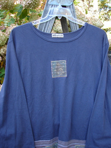 Barclay Patched Long Sleeved Café Top with Forest Twig Patches on Blue Shirt