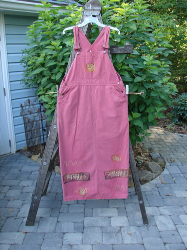 1996 Denim Overall Jumper Rock Journey Ember Size 1 displayed on a wooden rack, showcasing adjustable shoulder straps, metal button side adjustments, and a painted front bib pocket.