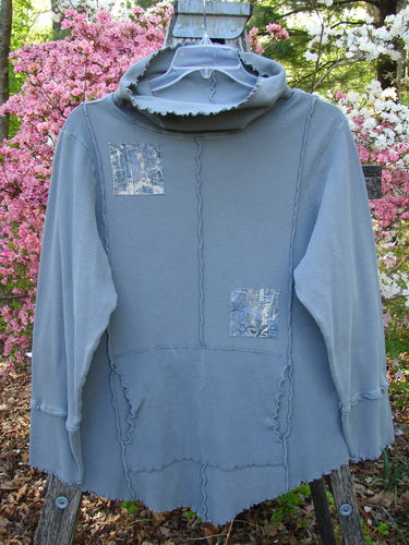 Barclay Patched Thermal Cowl Neck Roo Tunic Gray Day Size 1 with a wide cowl neck, exposed seams, and patchwork details, showcasing ribbed waffle cuffs and a lower drop kangaroo pocket.