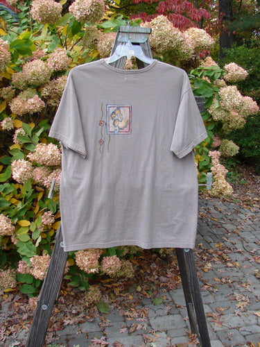 1999 Short Sleeved Tee with Circle Bloom design on organic cotton jersey. Size 1.