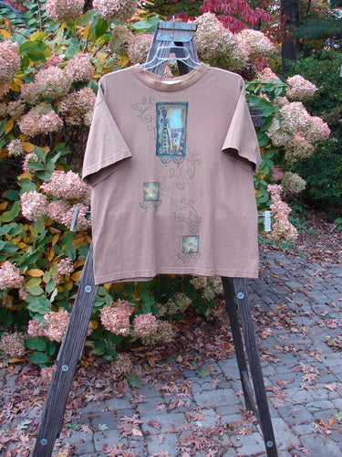 1997 Short Sleeved Tee Spirit Drum Lumber Size 1: A t-shirt with Spirit Woman and Drum theme paint, featuring a wooden ladder in the background.
