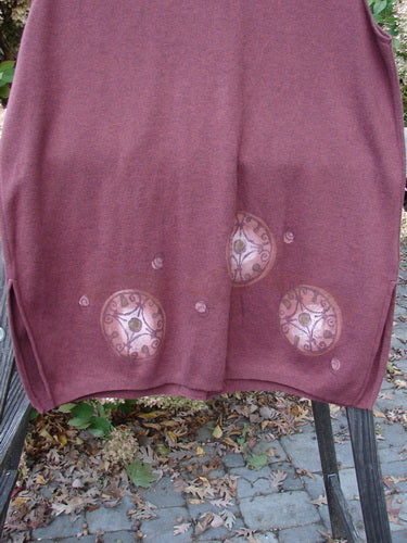 1997 Cashmere Archway Vest with Celtic Wheel design. Red skirt with circles, close-up of leaves on stone path, and clock.
