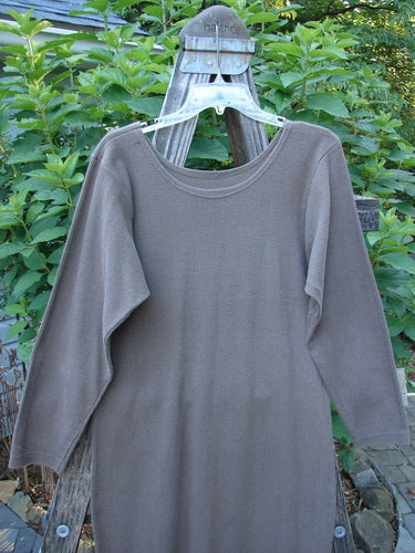 1991 Rib Thermal The Skinny Dress Unpainted Nut Brown Altered OSFA on a hanger, showcasing its long sleeves, rounded neckline, and straight linear shape.