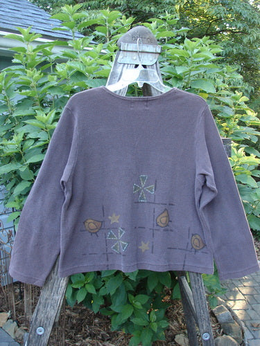 1999 Thermal Boatneck Pullover Chick Currant Size 0 displayed on a clothes hanger, showcasing its long sleeves, A-line shape, two front pockets, and thermal fabric texture.