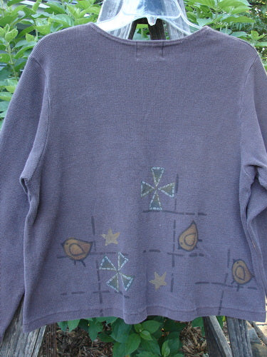 1999 Thermal Boatneck Pullover Chick Currant Size 0, featuring an A-line shape, billowy front pockets, and bird-themed design, showcased in a close-up revealing its cozy, stretchy thermal fabric.