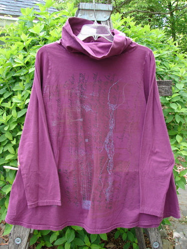 Barclay Cowl Neck Long Sleeved A Line Top Rock Note Merlot Size 0, featuring a draped cowl neck, abstract print, and sweet curly edgings, displayed outdoors on a clear plastic hanger.