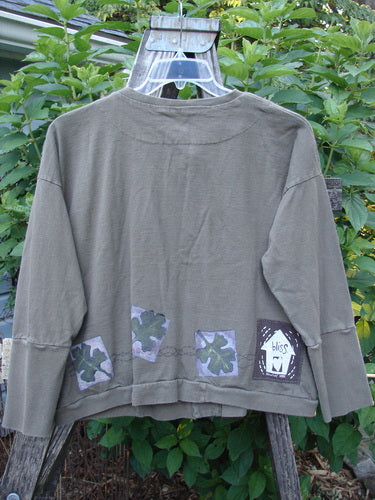 1999 Cottage Cardigan Forest Leaf Mud Size 0 features long sleeves, patches, ribbed lower sleeves, double-layered neckline, hemline, and front pocket, with oversized buttons and Blue Fish patch detailing.