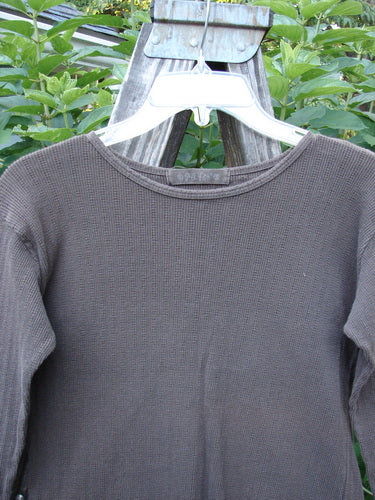 1998 Pointelle Long Sleeved Undertop Top Unpainted Stick Size 1 displayed on a hanger, showcasing its soft rib knit pattern, cozy long sleeves, and rolled neckline.