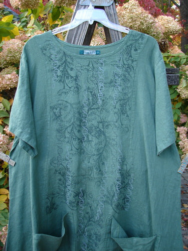 Barclay Linen Two Pocket Curve Dress featuring Botanical Vine design in Fresh Moss, Size 2. Vintage Blue Fish Clothing by Jennifer Barclay, known for creative, individual style expressions.