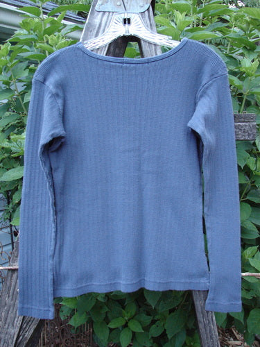 1998 Pointelle Long Sleeved Undertop Top Unpainted Orion Size 0 displayed on a hanger, showcasing its soft rib knit pattern, rolled neckline, and cozy long sleeves.