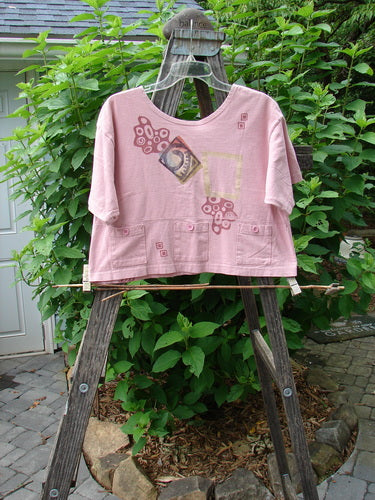 1996 Collector's Top Abstract Pebble Petal Size 1 displayed on a wooden ladder, showcasing its wider painted neckline, slight A-line flare, and multiple pockets adorned with tiny original paper buttons.