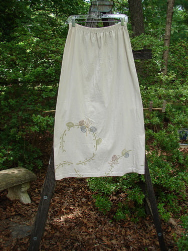 1995 Straight Skirt Life Circle Natural Size 1 displayed on a wooden stand, showcasing its slightly flared lower hem and floral design, part of Bluefishfinder.com's vintage collection.