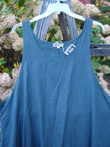 Barclay NWT Linen Flared Pinafore Shift Dress on a swinger, close-up of jeans.