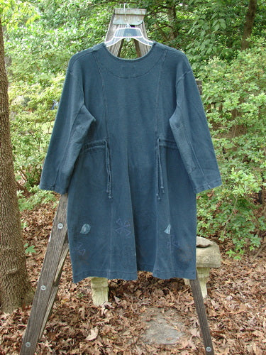 1999 Thermal Home Dress Paisley Peacock Size 0 displayed on a wooden ladder, featuring a squared neckline, soft elbow patches, and unique sectional panels.