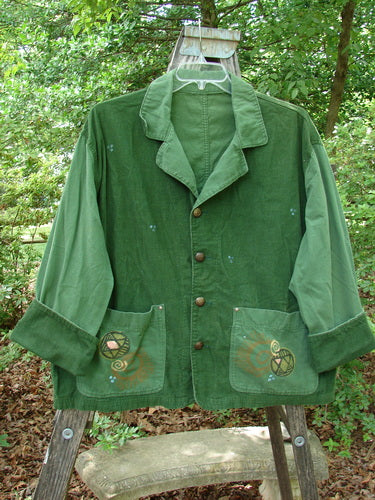 1997 Mason's Jacket Structural Verdigris OSFA featuring a folded neckline, two front pockets, cuffed sleeves, and metal buttons with rivets on pocket edges, made from soft corduroy and lightweight cotton.