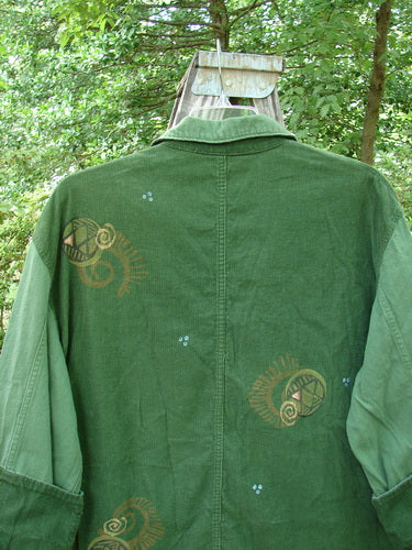 1997 Mason's Jacket Structural Verdigris OSFA featuring a uniquely folded neckline, two front painted pockets, cuffed cord sleeves, swirl metal buttons, and tiny rivets on pocket edges.