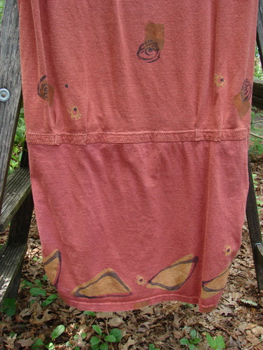 Alt text: 1990 B Base Dress Abstract Indian Sun Altered OSFA displayed outdoors on a wooden railing, showcasing its unique rounded hem and ruching details.