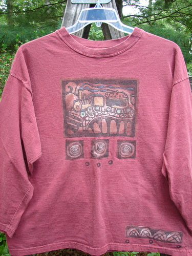 1995 Long Sleeved Tee Vintage Train Hollyberry Size 1 featuring a vintage train paint theme, thicker ribbed neckline, drop shoulders, and hem paint accent.