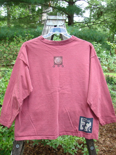 1995 Long Sleeved Tee Vintage Train Hollyberry Size 1 on a swinger, showcasing a thicker ribbed neckline, drop shoulders, hem paint accent, and superior vintage train theme paint.