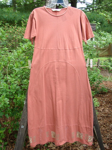 1998 Croquette Dress Games Rover Altered Size 1, featuring a shallow rolled neckline, sectional vertical rounded panels, and a sweeping A-line shape, displayed on a clothesline outdoors.