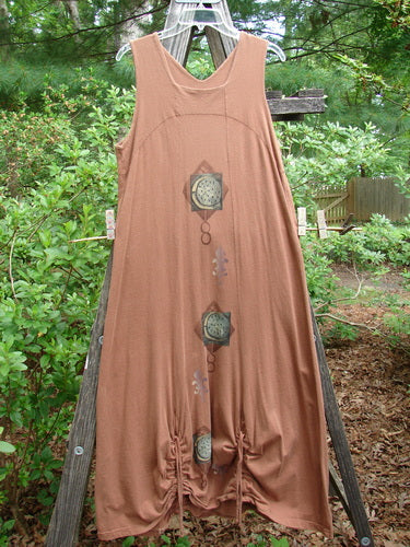 1998 Arcadia Jumper Harvest Moon Rockwood Altered Size 1, displayed hanging on a clothesline outdoors, showcasing its intricate design and full-length panels with a unique downward yoked empire waist seam.